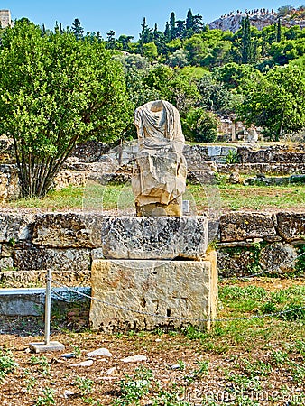 Headless sculpture at the Ancient Agora of Athens. Attica, Greece. Stock Photo