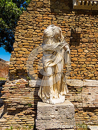 Headless Statue, Ancient Roman archaeological site of Ostia Antica in Rome, Italy Stock Photo