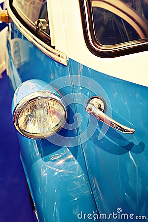 Headlight and handle opening door of single vintage car Stock Photo