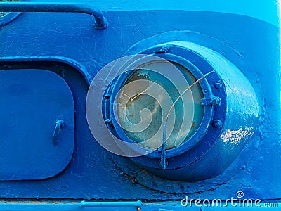 headlight of an old blue steam locomotive close up Stock Photo