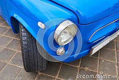 The headlight of an old small car Stock Photo