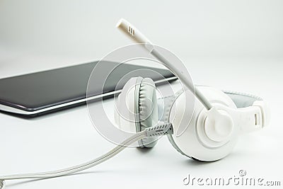 Headphone Laptop Notebook with white background Stock Photo