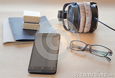 Headphone mobile notebook small box. Stock Photo