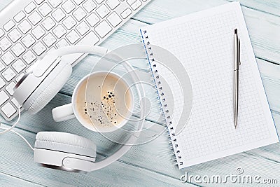 Headphones, coffee, notepad and pc Stock Photo