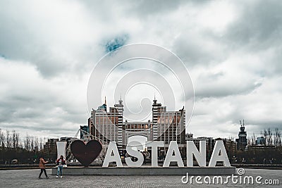 Headquarters head office of the KazMunaiGas in Astana Kazakhstan with I love heart Astana sign Editorial Stock Photo