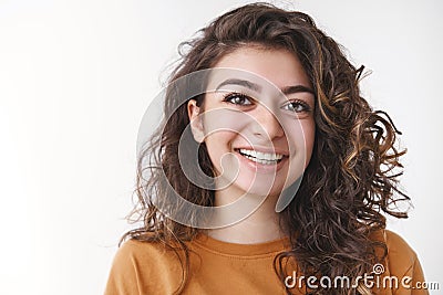 Headshot carefree happy lucky young curly-haired positive caucasian woman laughing smiling having fun enjoying perfect Stock Photo