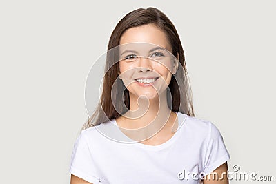 Headshot of happy millennial woman smiling looking at camera Stock Photo