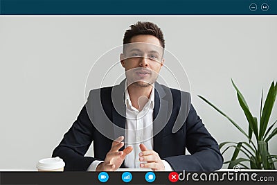 Headshot of male employee have online interview on laptop Stock Photo