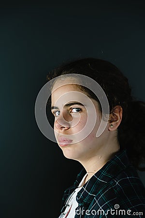 Headshot portrait of defiant teenager Stock Photo