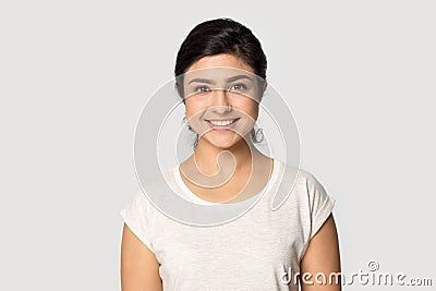 Headshot portrait of smiling indian girl posing in studio Stock Photo