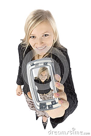 Headshot of young blonde woman with palmtop Stock Photo