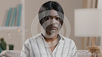 Headshot young unhappy depressed african american woman suffering from bullying racism portrait disappointed worried Stock Photo