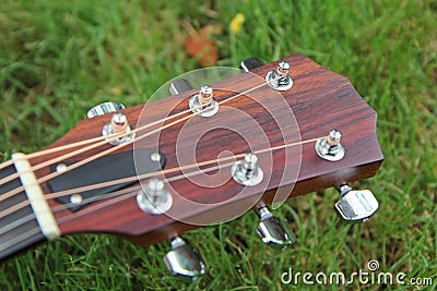 Headstock of acoustic guitar Stock Photo