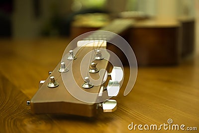 Headstock of acoustic guitar Stock Photo