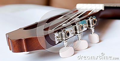 Headstock of classical guitar close up Stock Photo