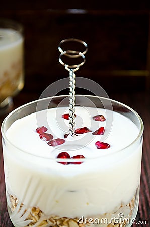 Healhty breakfast with oatmeal, greek yogurt and pomegranate Stock Photo