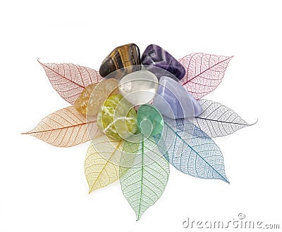 Healing Chakra Crystals on Leaves Stock Photo