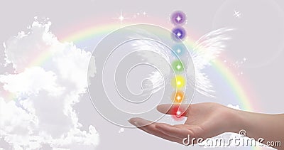 Healing hand with seven chakras Stock Photo