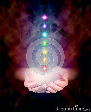 Healing Hands and Seven Chakras Stock Photo