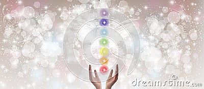 Healing Hands and seven chakras Stock Photo