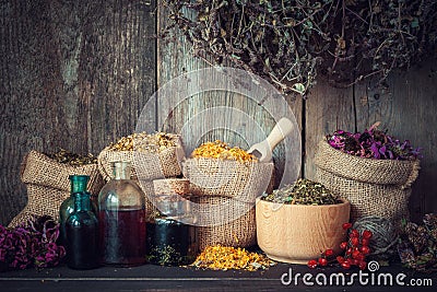 Healing herbs in hessian bags Stock Photo