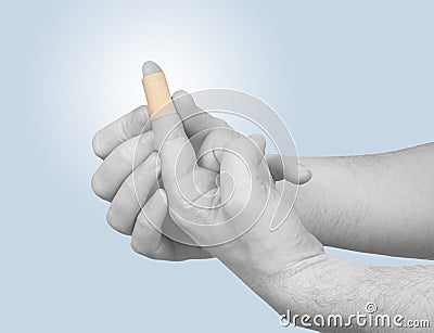 Healing plaster on finger. Stock Photo