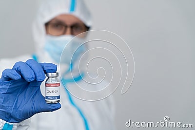 A healtcare worker shows a vaccine against the Corona virus close up Stock Photo