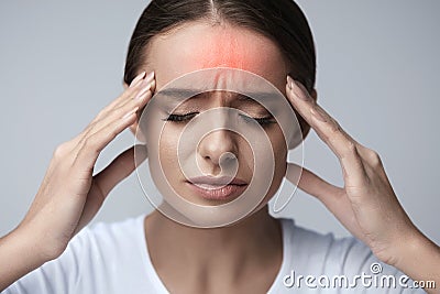 Health. Beautiful Woman Having Strong Headache, Feeling Pain Stock Photo