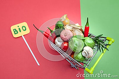 Health bio organic food concept, Shopping cart in supermarket full of fruits and vegetables, Stock Photo
