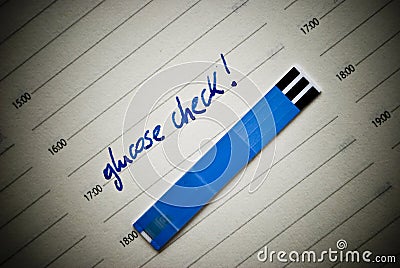 Health care concept. Stripes for glucose test and reminding note in personal organiser. Concept concerning diabetes. Stock Photo