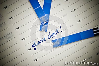 Health care concept. Stripes for glucose test and reminding note in personal organiser. Concept concerning diabetes. Stock Photo