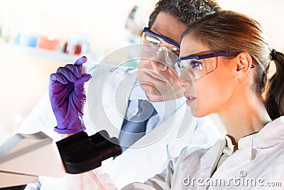 Health care professionals working in laboratory. Stock Photo