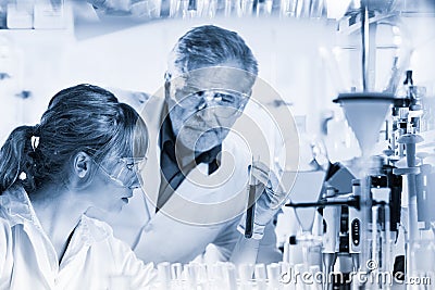 Health care researchers working in scientific laboratory. Stock Photo