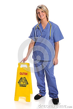 Health Care Worker With Safety Sign Stock Photo