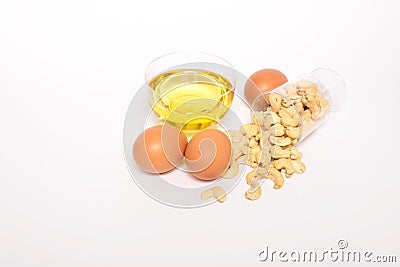 Health cashew nuts, olive oil, eggs Stock Photo