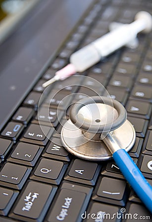 Health check on a laptop PC. Stock Photo