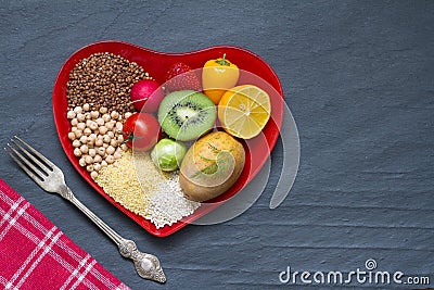 Health food on a red heart plate diets abstract still life Stock Photo