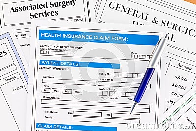Health Insurance Claim Form with Invoices Stock Photo