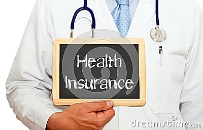 Health Insurance - Doctor holding chalkboard with text Stock Photo