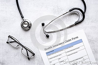 Health insuranse claim form, top view. Medical care concept. Stock Photo