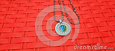 health necklace with a unique pendant design can improve blood circulation peredaran Stock Photo