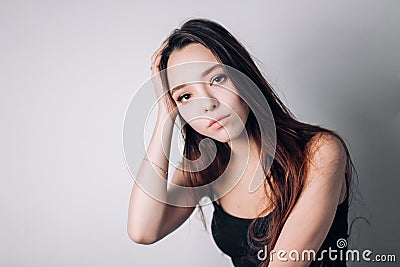 Health and pain. Stressed exhausted young woman having strong tension headache. Stock Photo