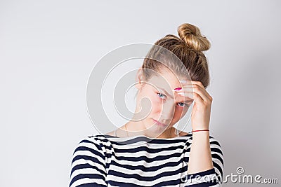 Health and pain.Young woman with hard headache holding hands on head Stock Photo