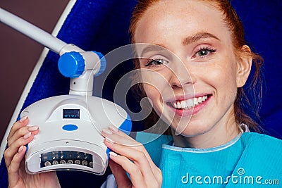 Health red-haired ginger woman with perfect smile, lips and teeth. Beautiful teen girl with white teeth and perfect skin Stock Photo