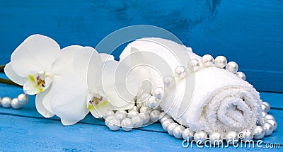 Health spa with white orchid and white towel Stock Photo