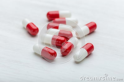 Health, vitamins and medical supplies concept - medicines and pills on white background Stock Photo