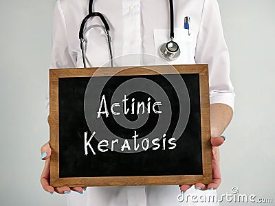 Healthcare concept meaning Actinic Keratosis with inscription on the piece of paper Stock Photo