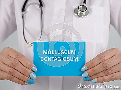 Healthcare concept meaning MOLLUSCUM CONTAGIOSUM with sign on the sheet Stock Photo