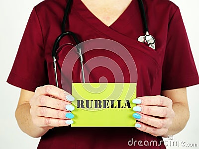 Healthcare concept about Rubella German Measles with phrase on the piece of paper Stock Photo