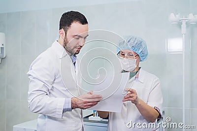 Healthcare: Doctor and patient discussing blood-test results Stock Photo